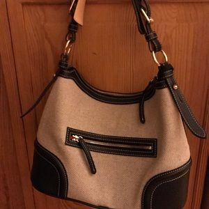 Authentic Dooney & Bourke bag with duster bag